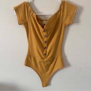 Yellow off-the-shoulder ribbed bodysuit